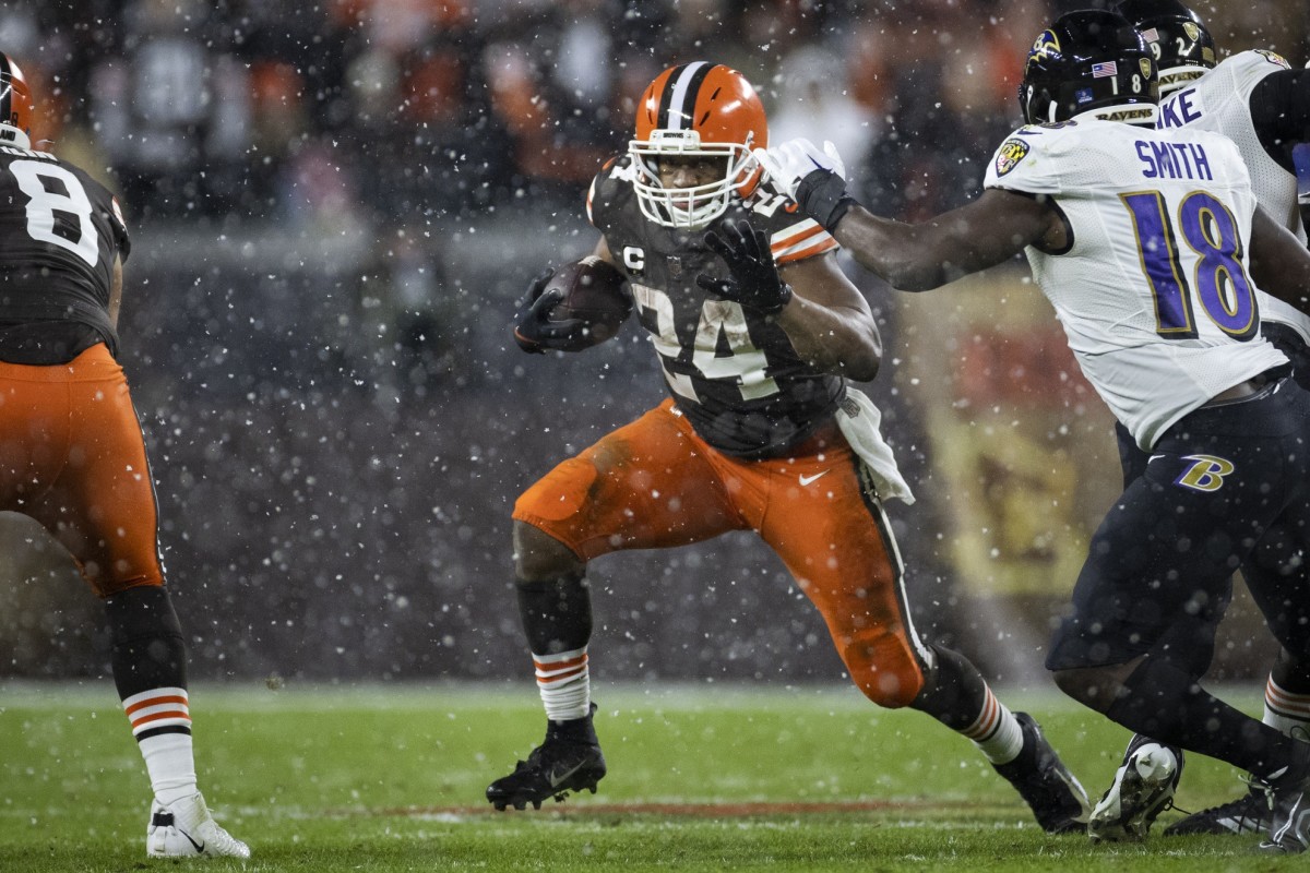 Cleveland Browns running back Nick Chubb (24) runs against the Baltimore Ravens. Mandatory Credit: Scott Galvin-USA TODAY Sports